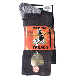 Mørke Merino Treads-vandresokker med orange produktmærke.