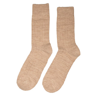 Beige angorauldsokker med ribkant, vist som et par.