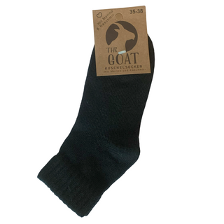 Sorte footies med merinould og cashmere, med produktmærke.