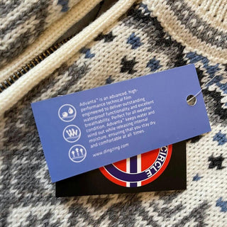 DINTEX-mærke til windbreaker-cardiganen med information om materialet.