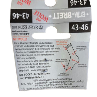 Emballagens bagside til mørke uldsokker, med produktinformation.